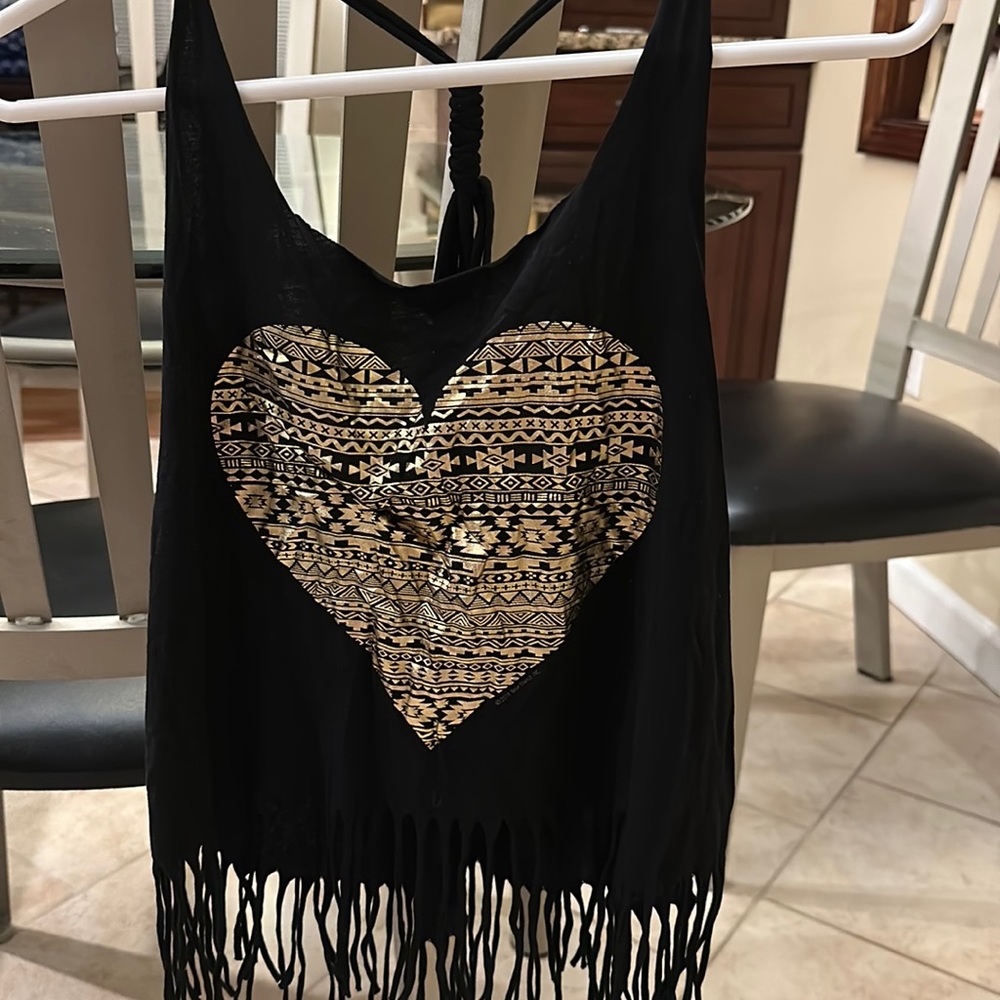 Size medium racerback top with fringes. Metallic gold heart design.